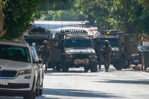 Israeli soldiers conduct operations near Nablus amid West Bank arrests and settler attacks