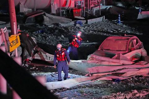 Rescue teams working at the scene of the Aeon Mall collapse following the 7.1 earthquake in Kumamoto Japan July 2026