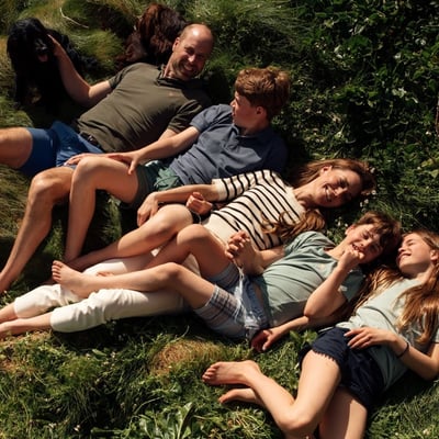 Prince William and Princess Kate with their three children in a summer family photo from their Instagram summer rewind post