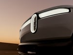 Rivian R2 electric SUV headlight as the company beats Q2 2026 delivery targets and raises guidance