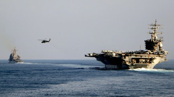 USS Dwight D. Eisenhower aircraft carrier crossing the Strait of Hormuz July 2026