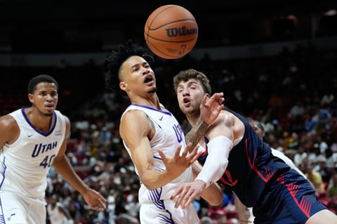 Trey Alexander of the Utah Jazz is stretchered off the court during NBA Summer League against the Chicago Bulls