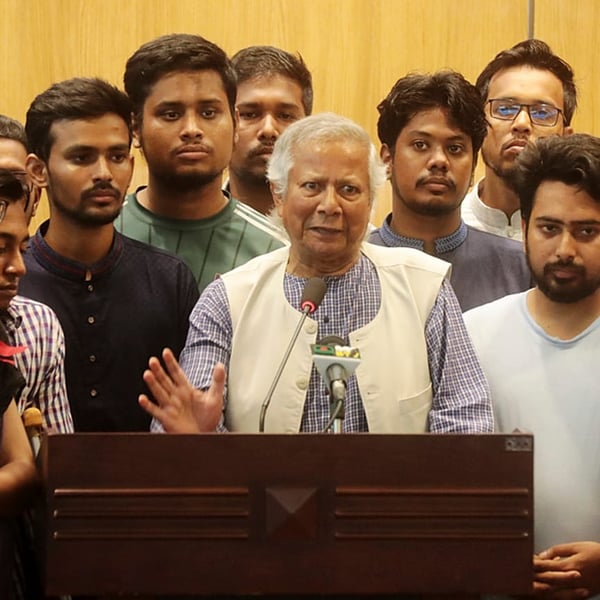 Muhammad Yunus speaking to media at Dhaka airport after being named head of Bangladesh interim government August 2024