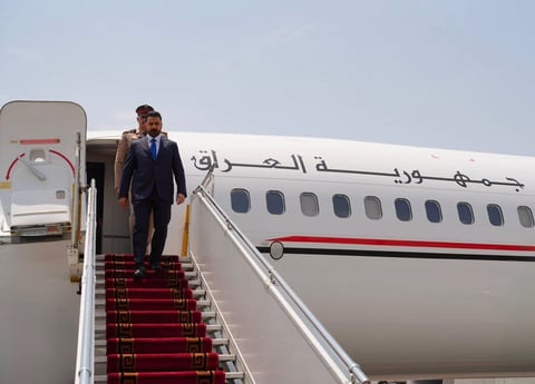 Iraqi Prime Minister al-Sudani and Turkish President Erdogan shake hands in Ankara