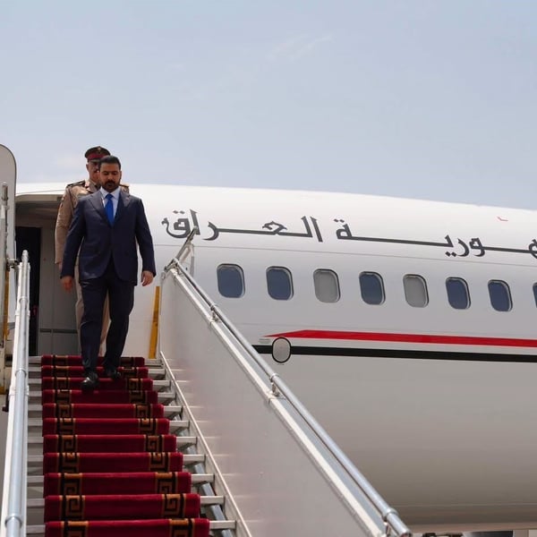 Iraqi Prime Minister al-Sudani and Turkish President Erdogan shake hands in Ankara