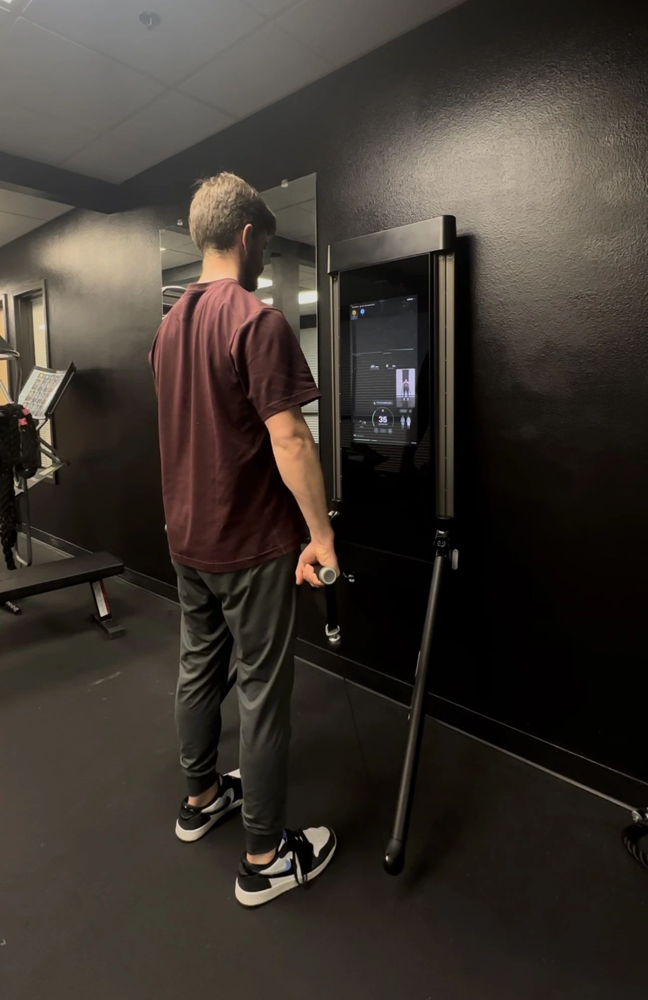 Functional workout area at Portland Indoor Golf Club featuring Tonal, TRX, and mobility tools