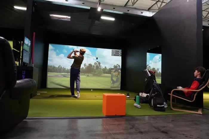 Golfer holding the finish on his swing