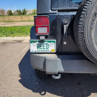 License plate: WEED,  State: CO