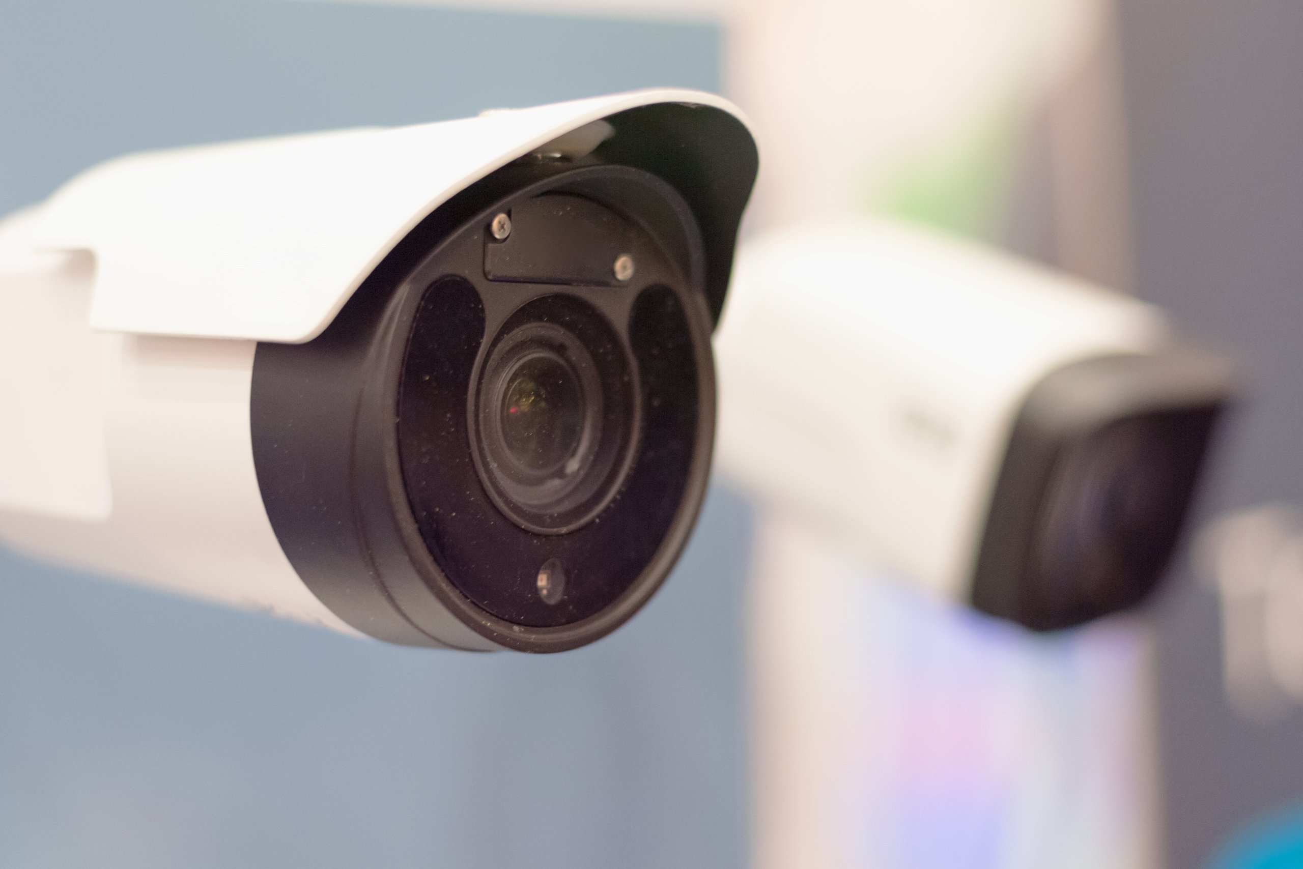 Security CCTV camera or surveillance system in office building, Intelligent cameras can record video all day and night to keep you safe from thieves. Surveillance camera Anti-theft system concept.