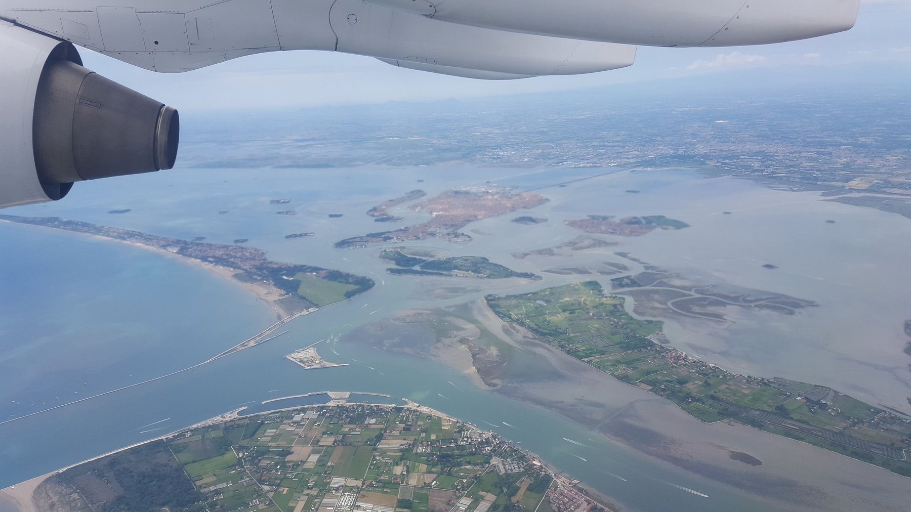 Islands from above, viewed from an airplane window.