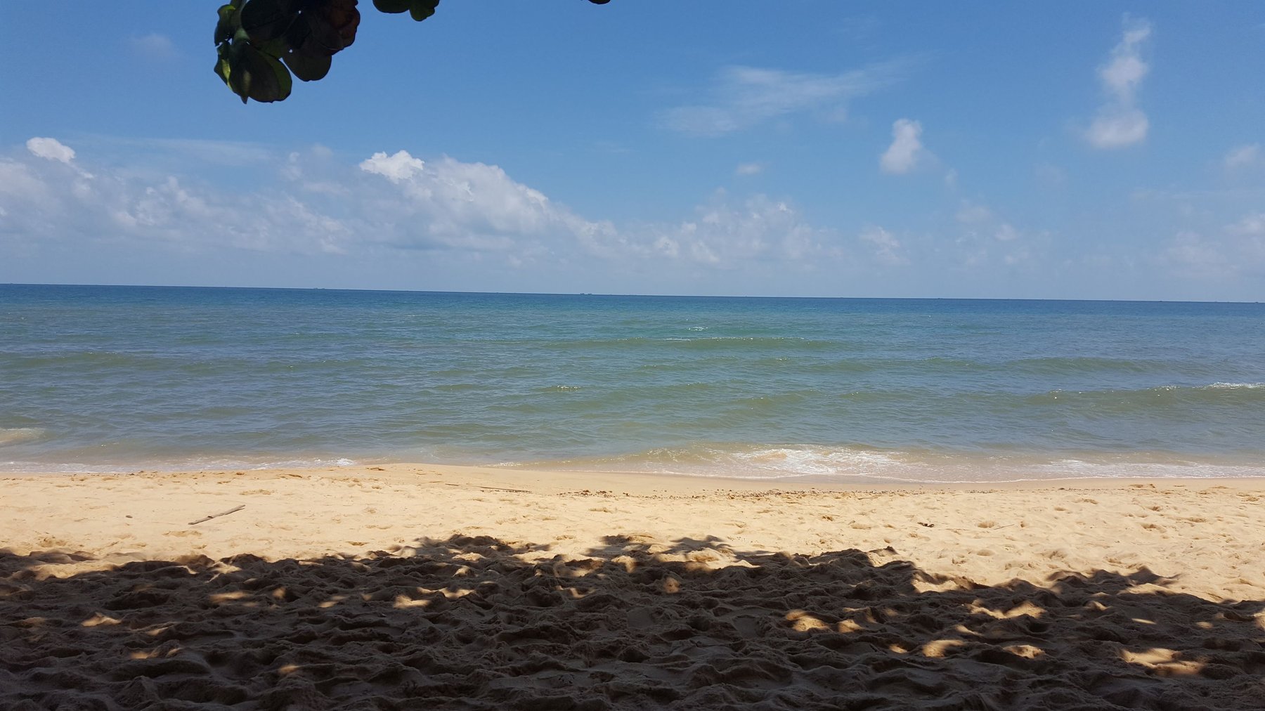 Still blue sea at the beach.