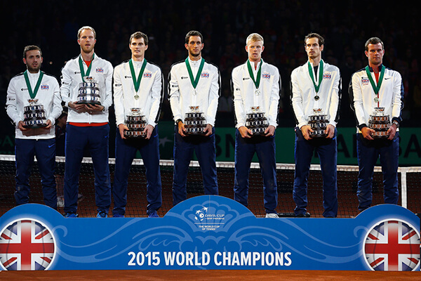 Jamie Murray and Team Great Britain with medals and Davis Cup trophy, celebrating their 2015 victory as world champions.