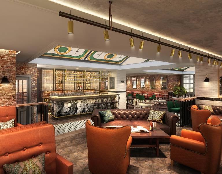 Interior of a trendy bar lounge with leather seating, modern bar, illuminated bottle shelves, and a mix of contemporary and classic design elements.