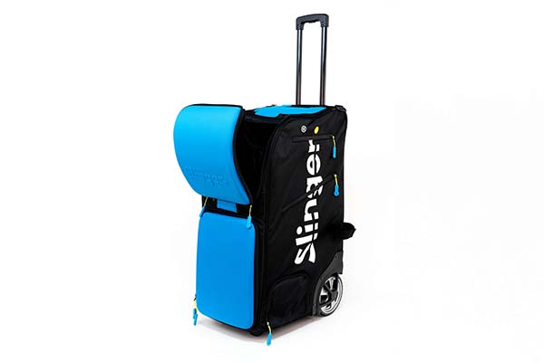 Slinger Sling Bag in black and blue, featuring a telescopic handle and wheels, shown partially open.