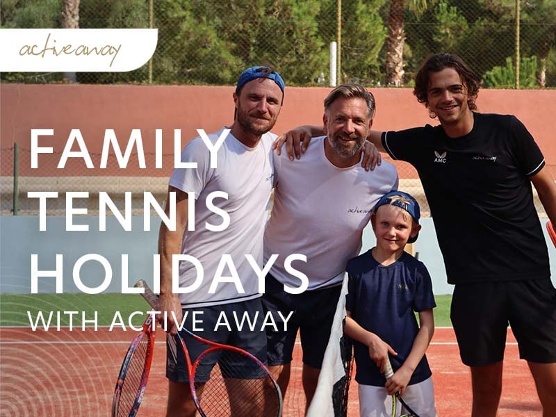Group photo of a family with tennis rackets on a tennis court, representing Active Away family tennis holidays.