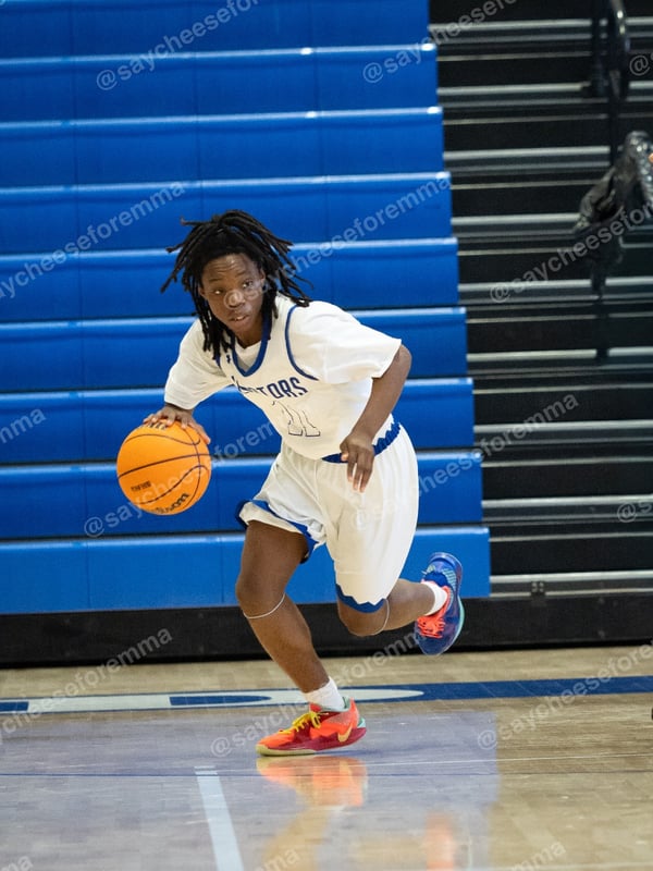 Photo 9 from Freshman basketball Dover vs. Cape