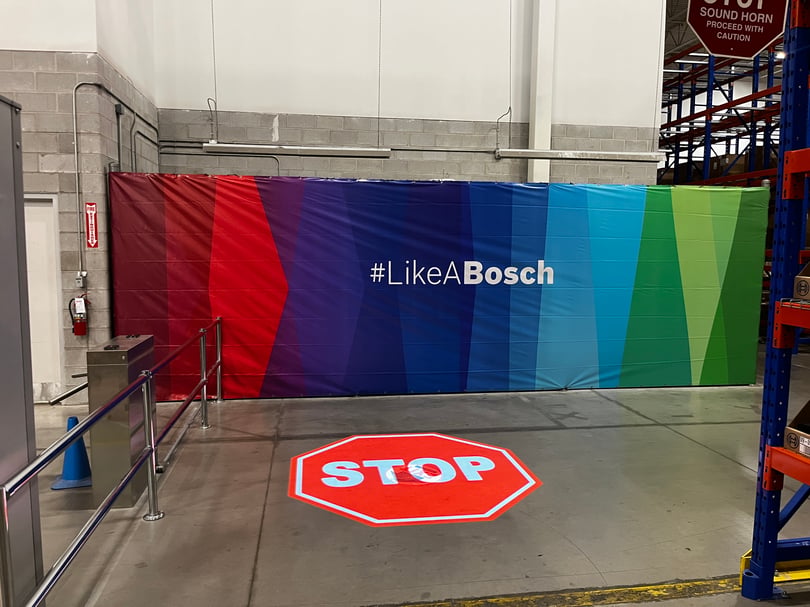 Banner installation for a partition in a warehouse in Toronto