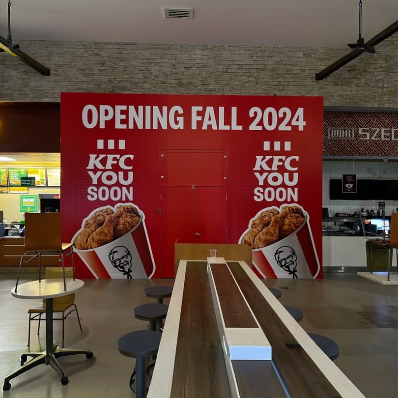 Branded construction hoarding graphics installation in Toronto