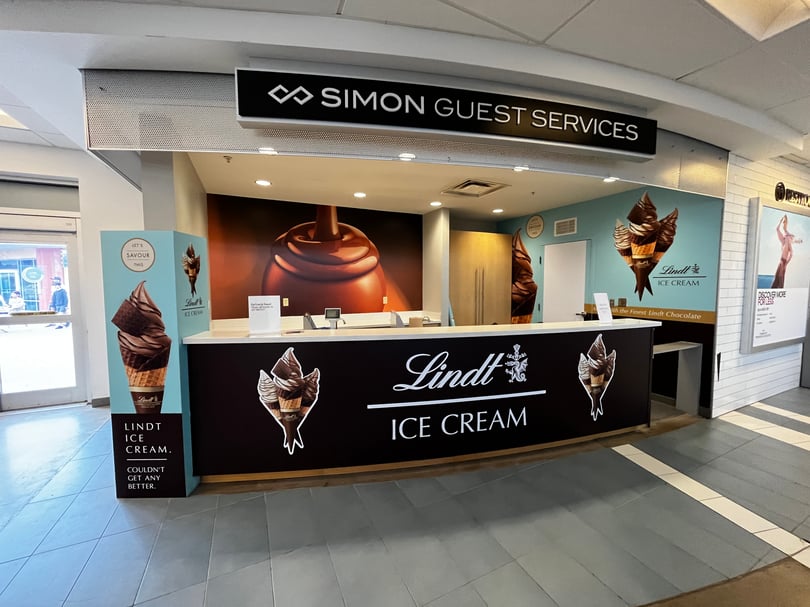 Pop-up kiosk signage and display graphics installation in Toronto