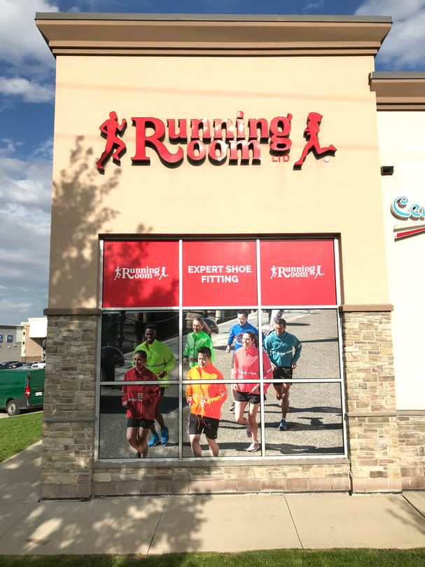 Commercial retail storefront branding window graphics installation in Mississauga
