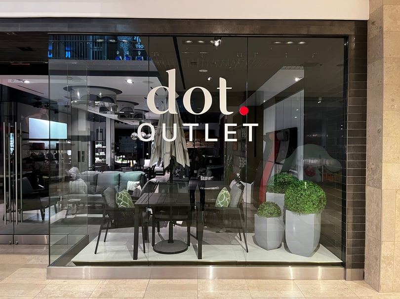 Branded storefront window graphics installation in Toronto