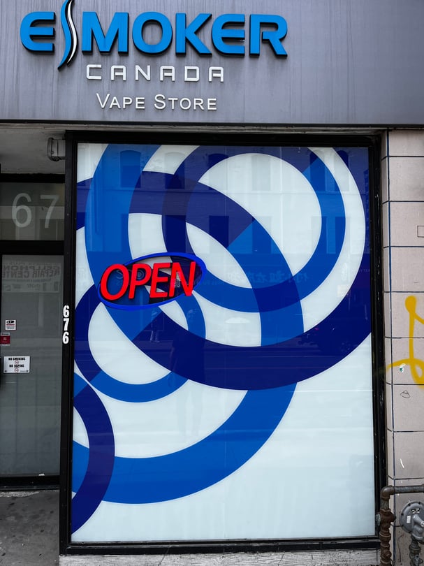 Cannabis retail storefront window branding and privacy window graphics installation in the GTA