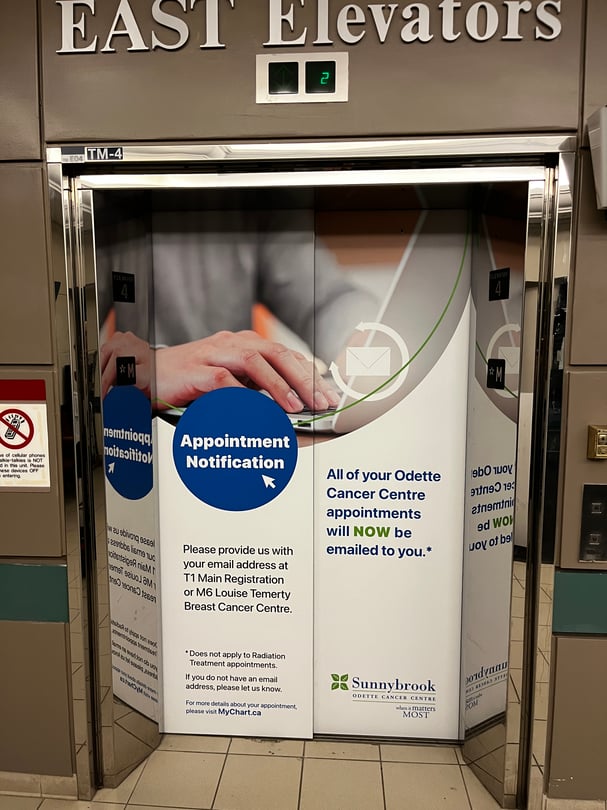 Elevator door signage graphics installation in the GTA