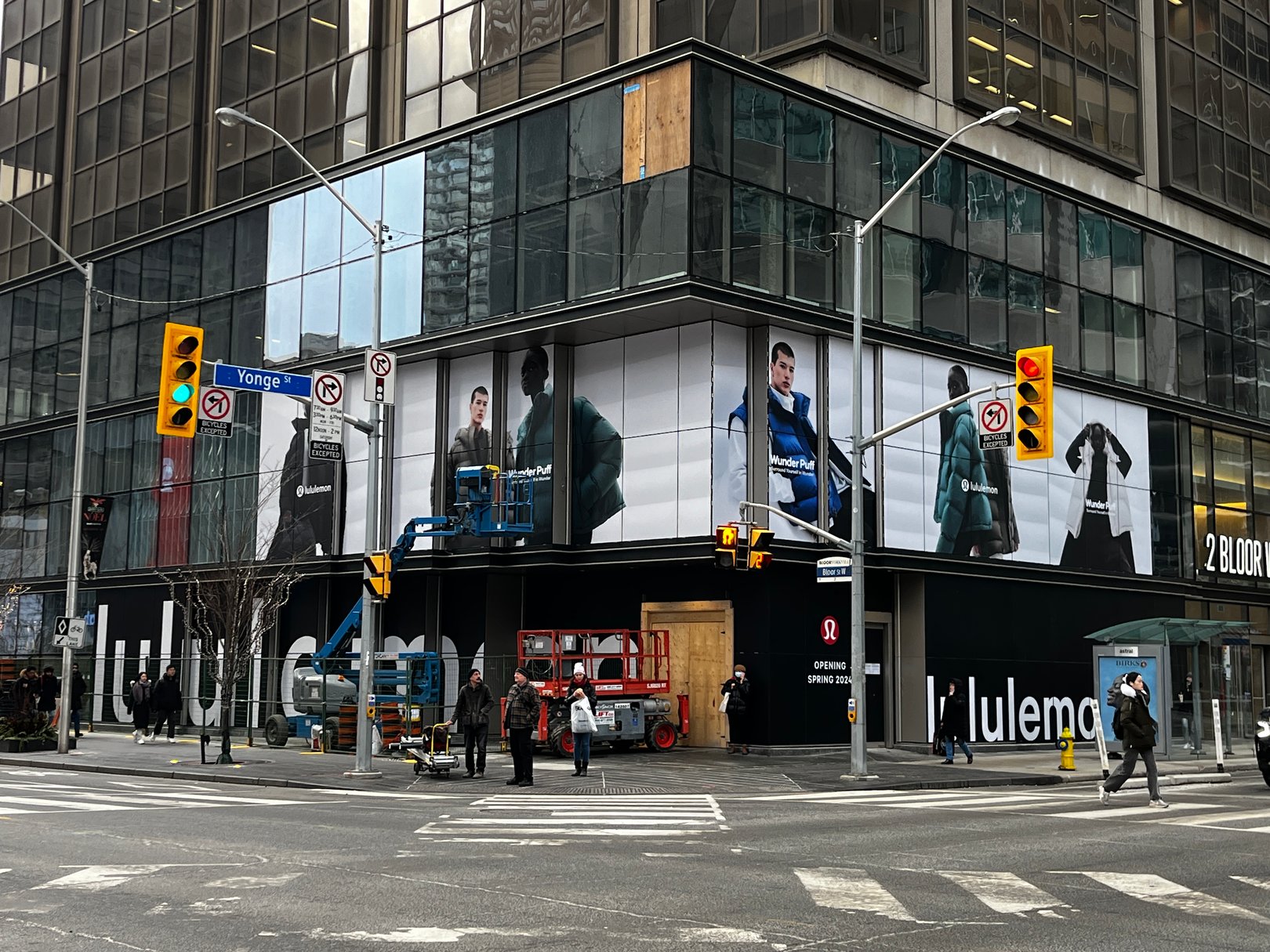 Exterior window branding graphics installation in Toronto