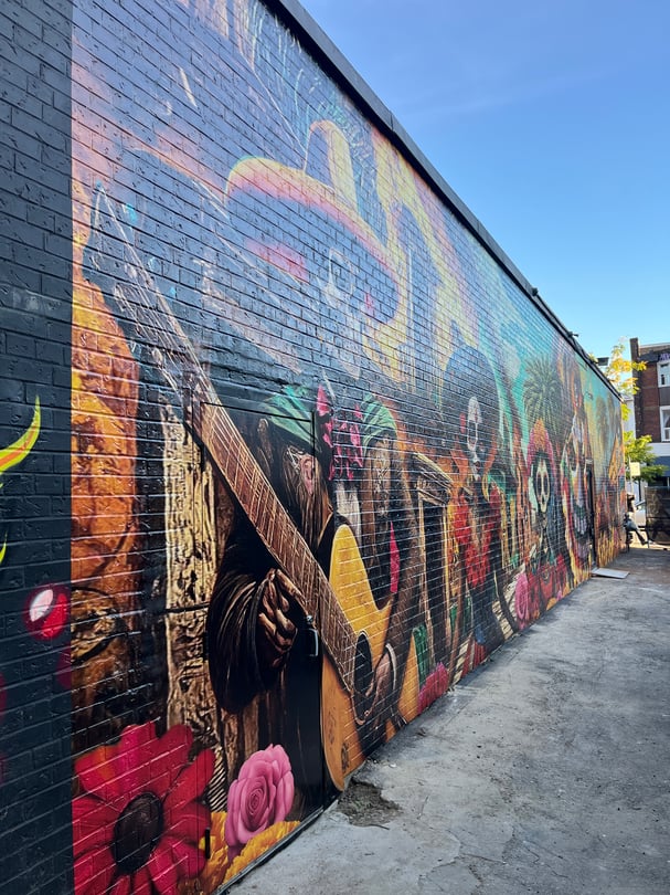 Brick wall mural vinyl graphics installation in Toronto