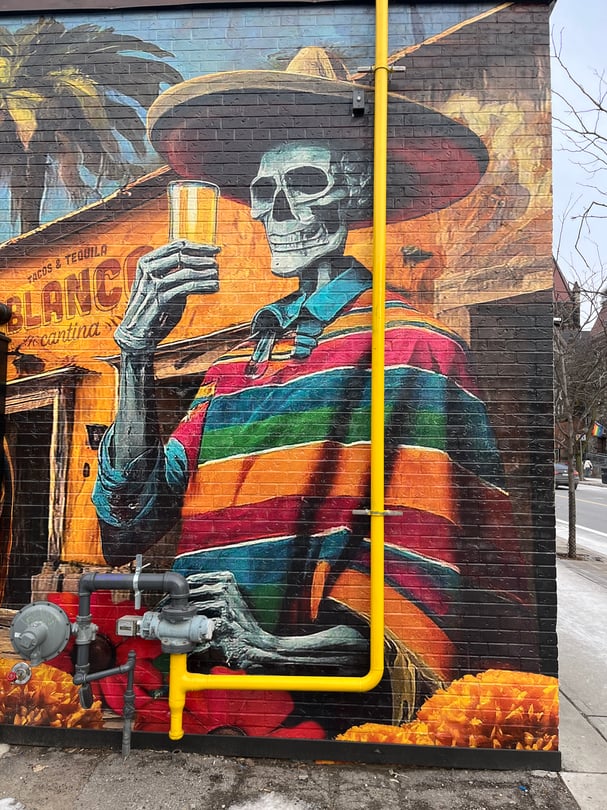 Brick wall mural vinyl graphics installation in the GTA