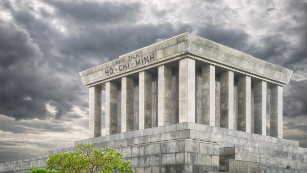 The Ho Chi Minh Mausoleum with gray clouds behind