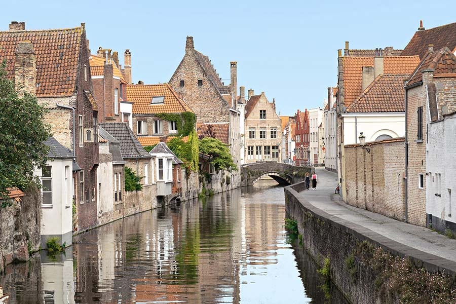 A canal in Bruges, Belgium at golden hour &mdash; the F/65 Group workshop destination.