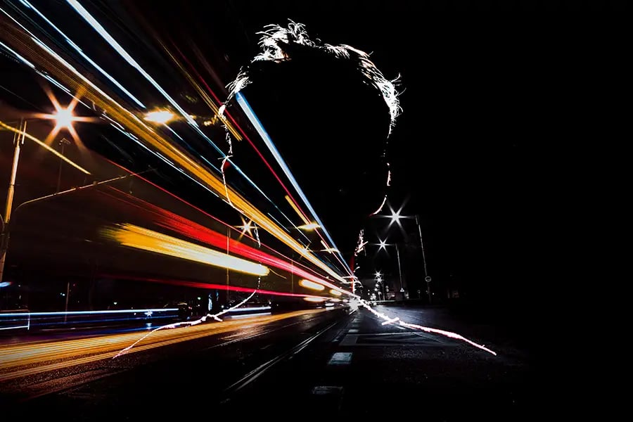 A double-exposure composite created in Photoshop using layered photographs.