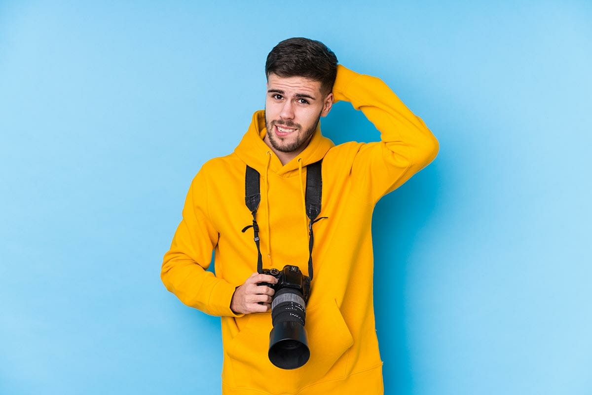 Young,Caucasian,Photographer,Man,Isolated,Being,Shocked,,She,Has,Remembered
