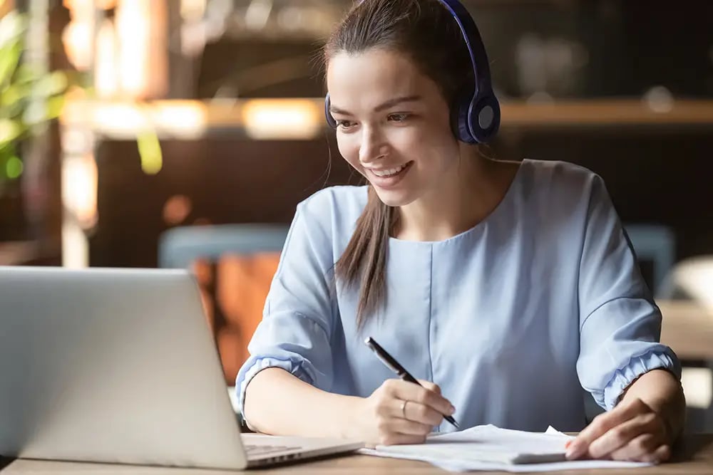 Woman on a video call laptop