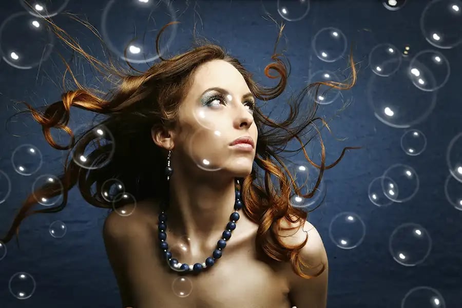A digital-art composite showing a portrait with water bubbles &mdash; from the Photoshop Digital Art Course.