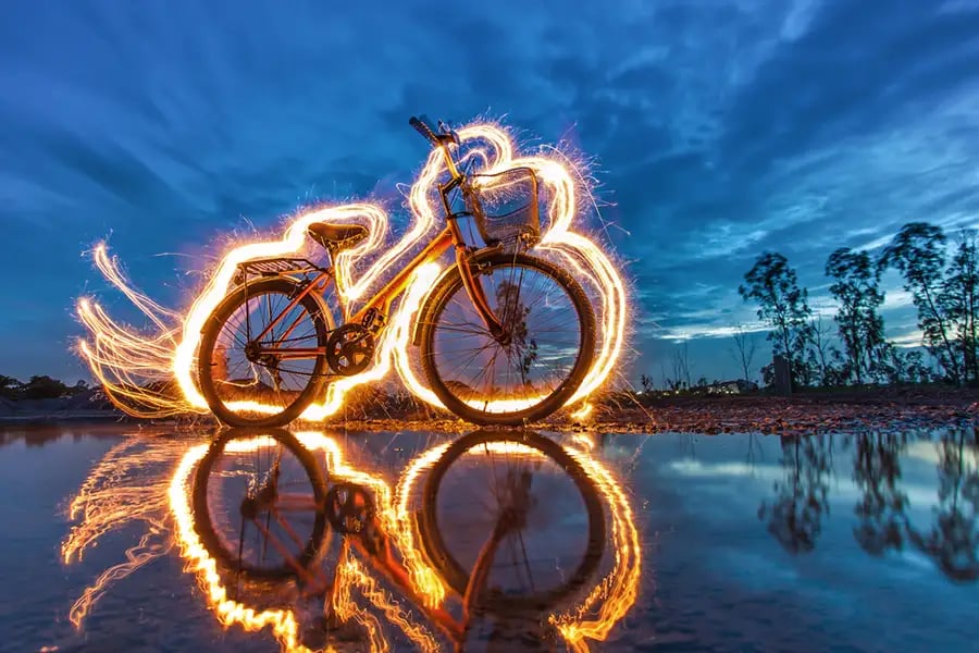 A light-painting photograph &mdash; a torch traced through a long exposure to draw with light.
