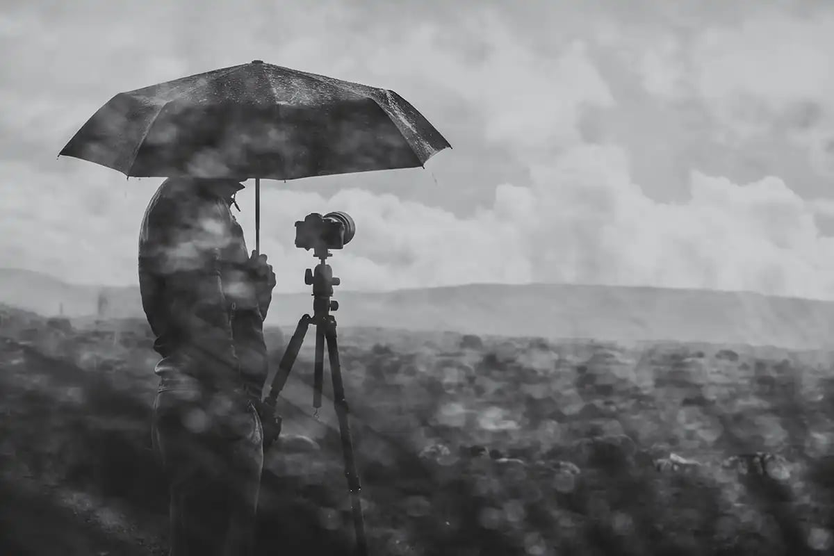 photographer in the rain