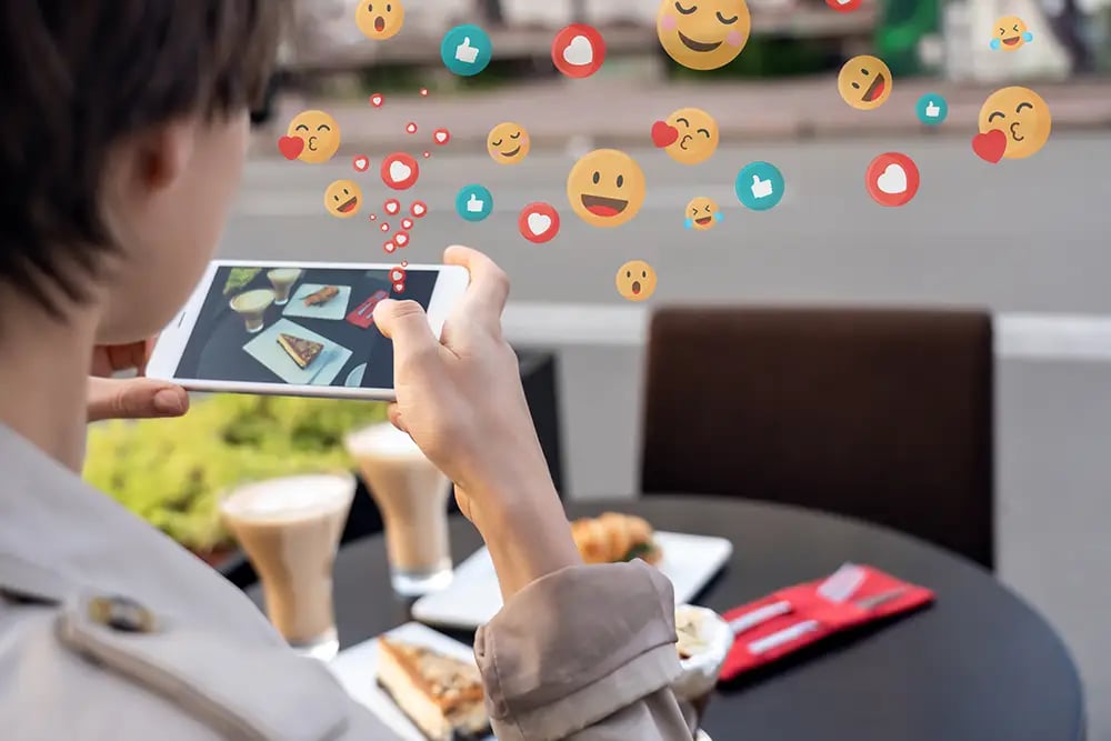 Social Media icons coming out of phone