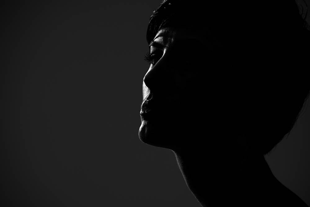 Low Light Portrait Photography Tips by iPhotography.com
