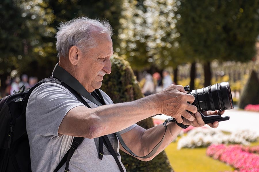 man taking photos