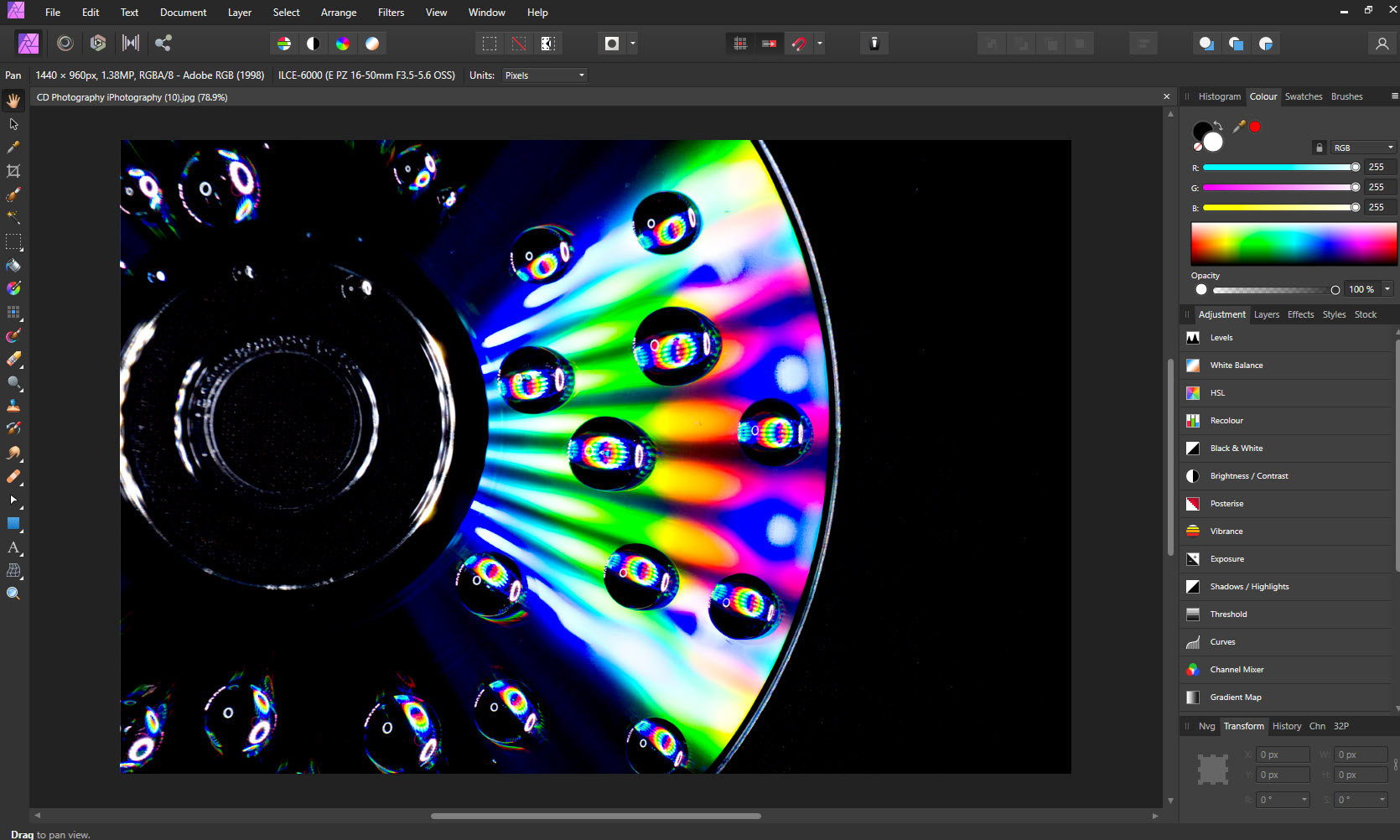 Affinity Photo open on a colourful CD macro photograph