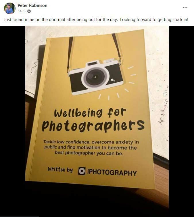 Wellbeing for Photographers book held by Peter Robinson, an iPhotography member.