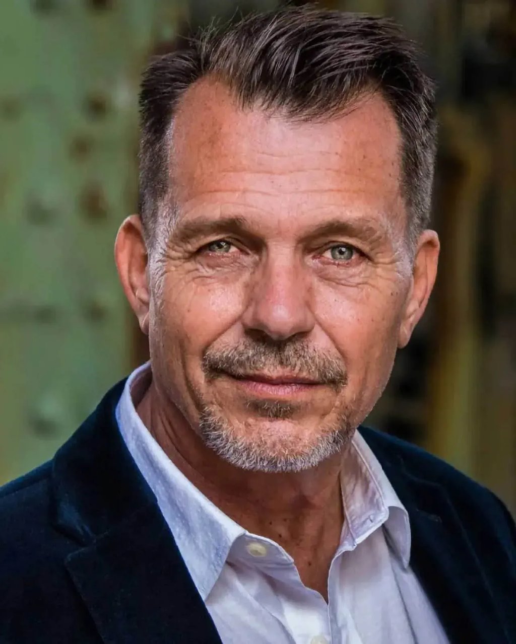 Professional headshot of a confident man photographed by Idaho Photography Studios in Boise, Idaho.
