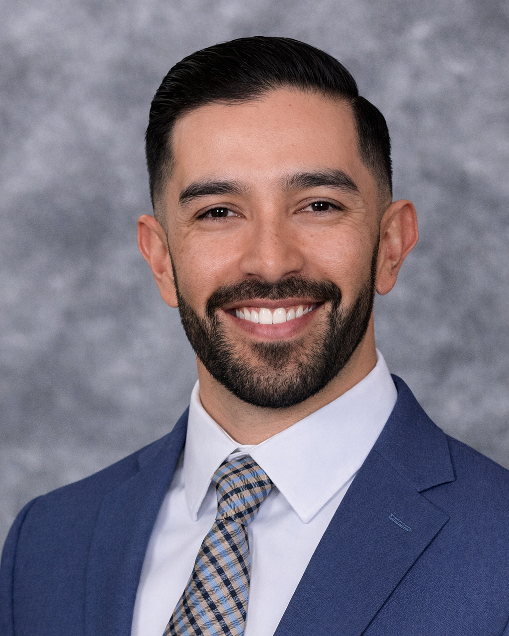 Professional Idaho business headshot of a construction worker in branded workwear, created for company websites, LinkedIn profiles, and team marketing.