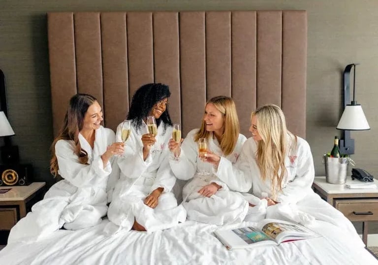 Hospitality Photography: Ladies Celebrating in Hotel Room