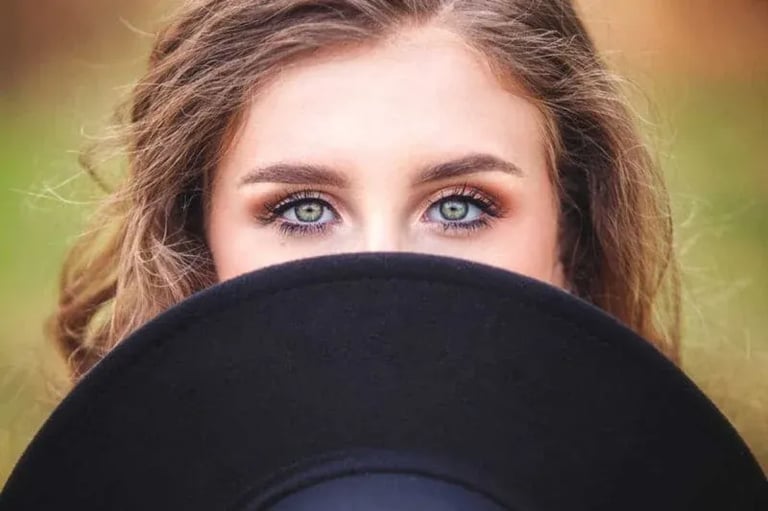 Senior Portraits: Senior with Hat and Green Eyes