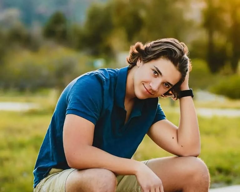 High School Senior Portrait: Senior in Field