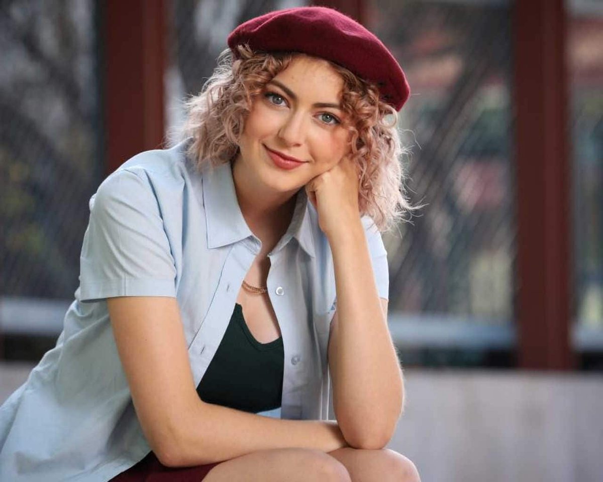 High School Senior Portrait: 3/4 Senior Girl with Purple Baretta Hat