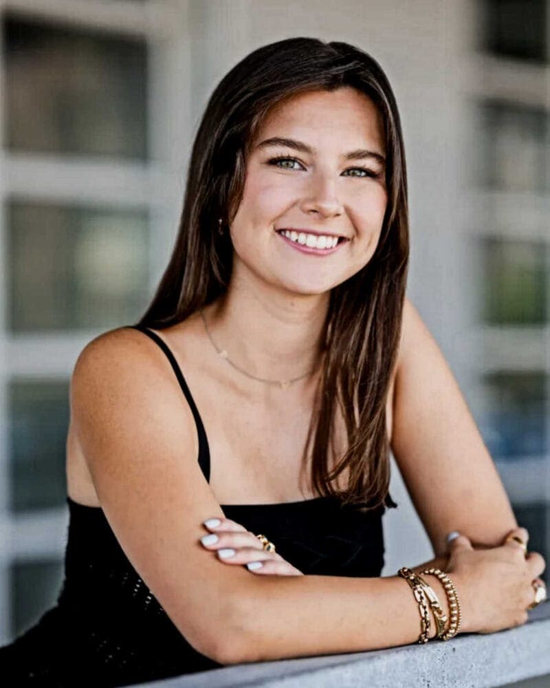 High School Senior Portrait: Girl Leaning on Railing
